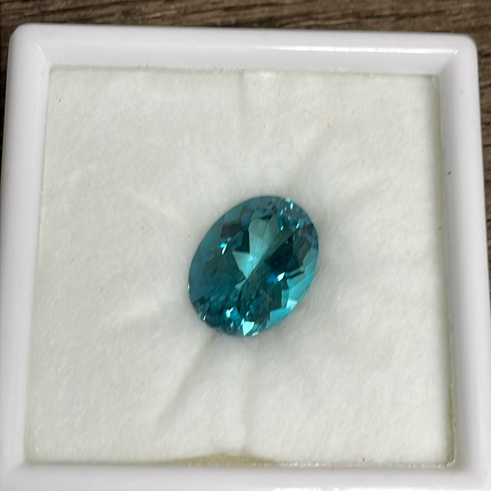 10.00ct 12X16 oval Ceylon Nickel Topaz.​​